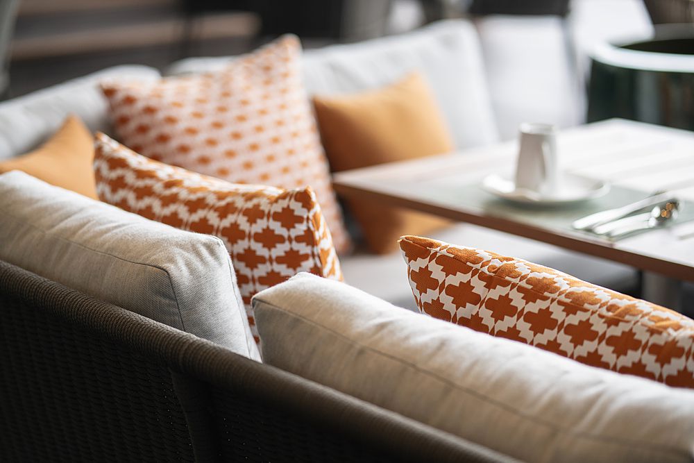 Outdoor patio styled with fall color trends.